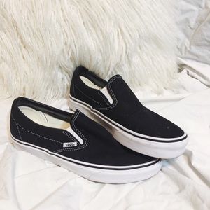 Black slip on vans, men’s size 7.5 women’s size 9